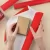 Papier do pakowania prezentów czerwony z kokardą (200 x 57 cm)