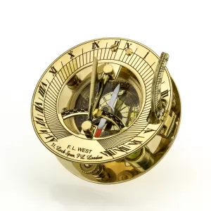 złoty kompas z zegarem słonecznym
